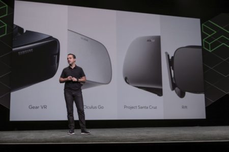 Showing off the Oculus hardware at OC4 (Photo credit: Facebook)