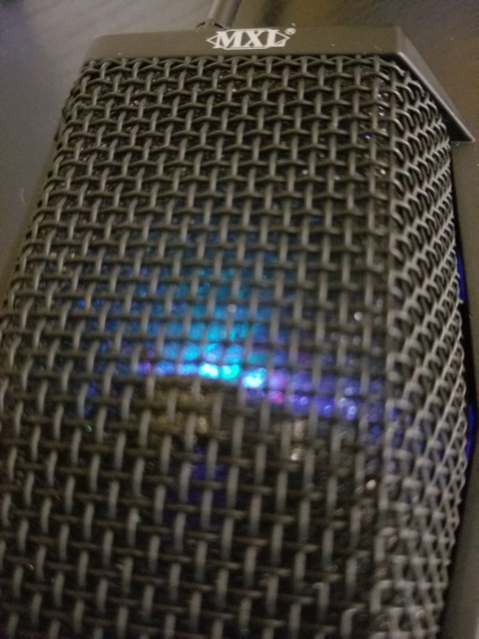 Close-up of the MXL AC-404 LED mic grille and lighting