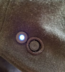 Atari's Speakerhat button and light