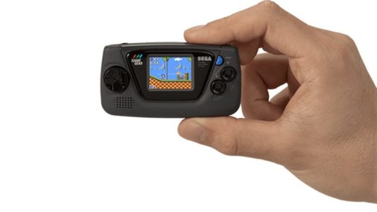 Sega Game Gear Micro held in hand
