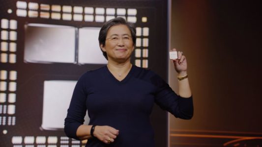 AMD CEO Lisa Su holding a Ryzen 5000 series GPU 
