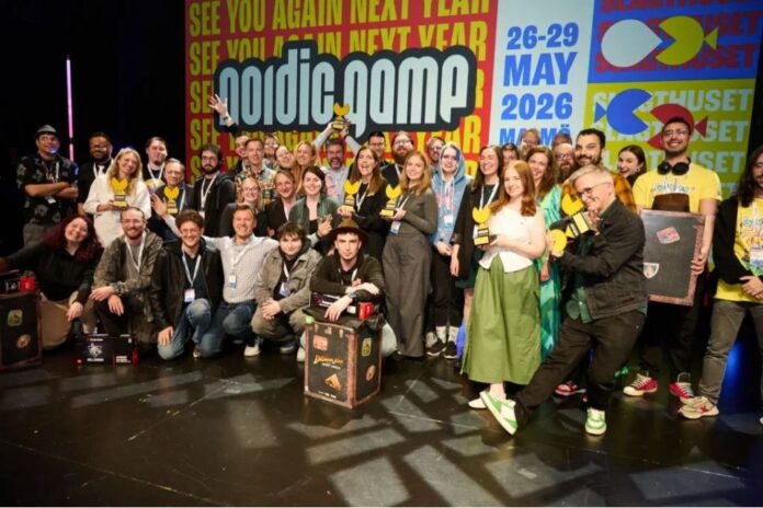 Nordic Game 2025 Awards participants with banner for Nordic Game 2026 Spring behind them